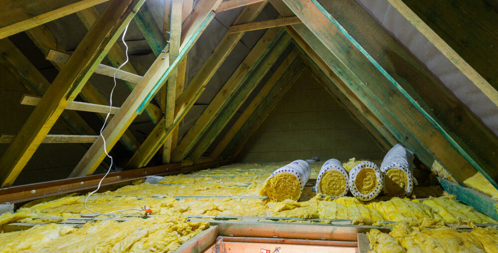 how to install attic insulation over existing